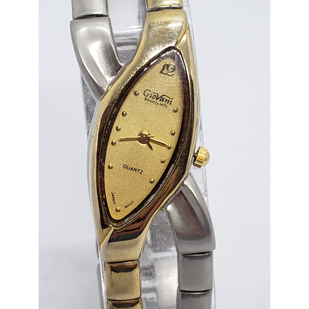 Giovani Beverly hills women's watch. Gold oval face tilted. Working watch.